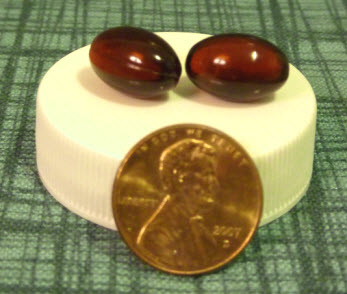 2 EFA Icon Krill Oil capsules are only the size of a penny